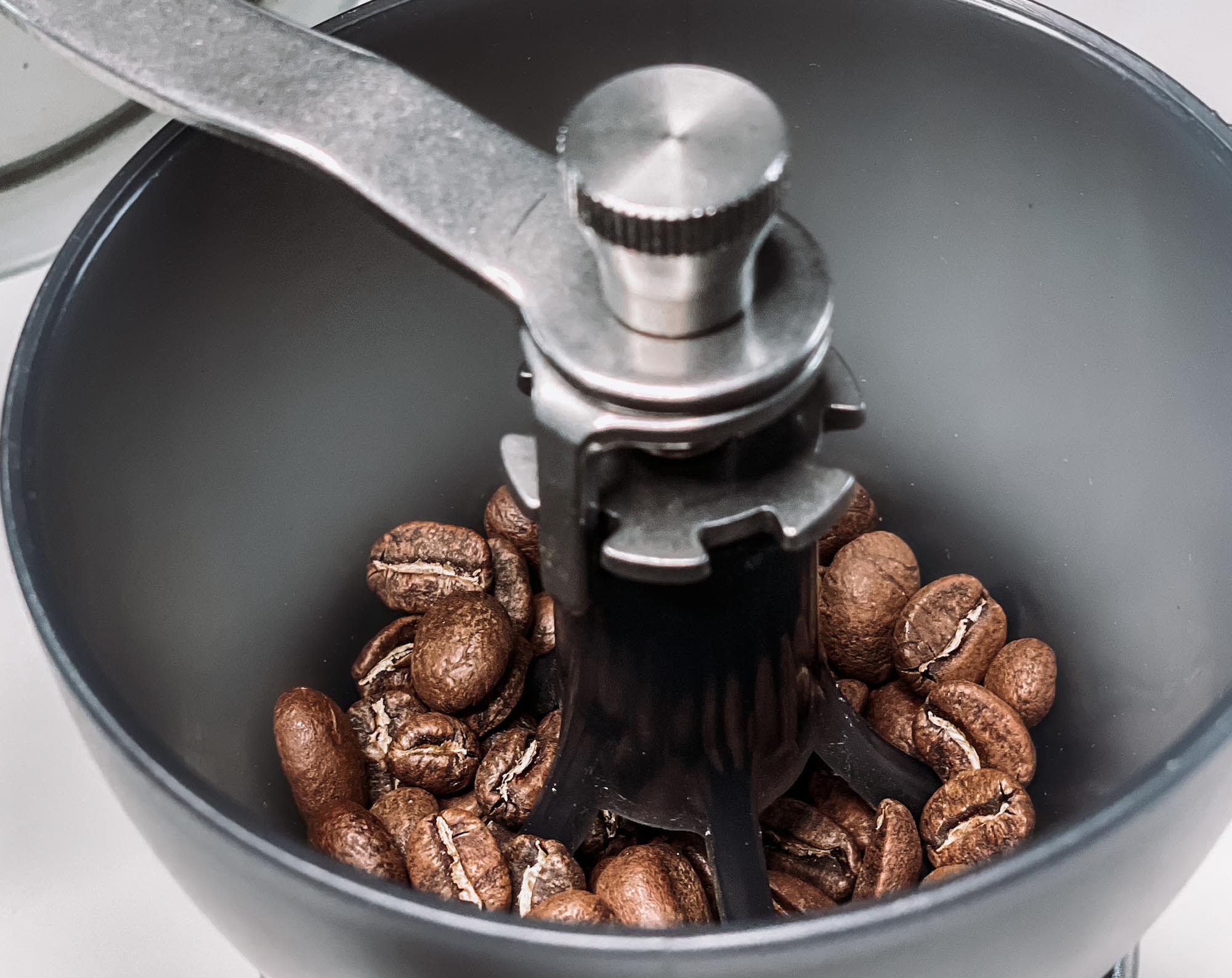 up close image of a manual coffee grinder